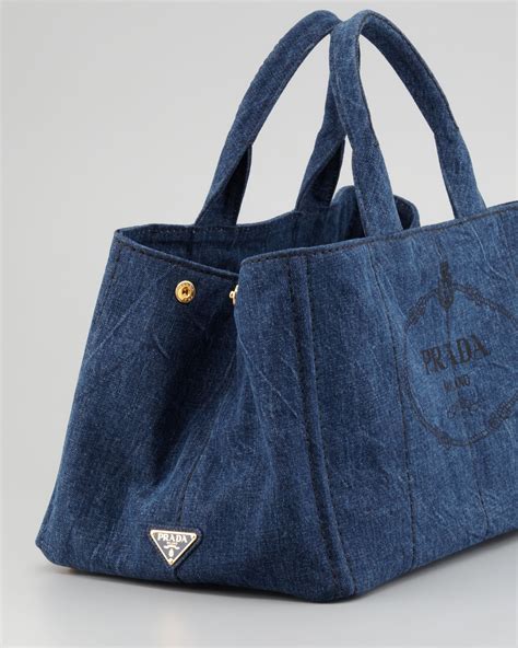 prada denim tote.